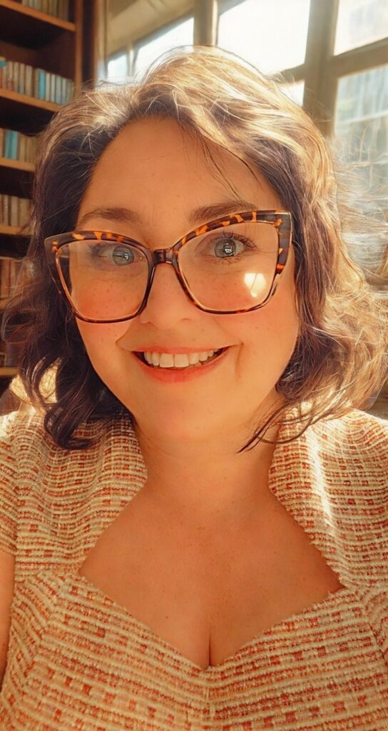 Photo of lawyer in front of bookcases